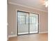 Sliding glass door leading to a private patio at 407 Coleraine Se, Smyrna, GA 30080