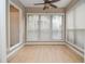 Sunroom with ample natural light and window seating at 407 Coleraine Se, Smyrna, GA 30080