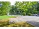 Well-maintained tennis court with surrounding trees at 407 Coleraine Se, Smyrna, GA 30080