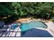 Aerial view showing a home with a private pool and lush landscaping at 5236 Weatherwood Trce, Marietta, GA 30068