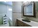 Bathroom with a shower, bathtub, and unique patterned tile at 5236 Weatherwood Trce, Marietta, GA 30068