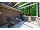 Deck features pergola, seating area, and overlooks wooded area at 5236 Weatherwood Trce, Marietta, GA 30068