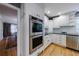 Kitchen features double ovens and white cabinetry at 5236 Weatherwood Trce, Marietta, GA 30068