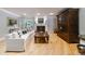 Bright living room showcasing hardwood floors and a curved sofa at 5236 Weatherwood Trce, Marietta, GA 30068