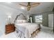 Luxurious main bedroom with king-size bed and ensuite bathroom access at 5236 Weatherwood Trce, Marietta, GA 30068