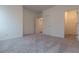 Spacious bedroom with grey carpet and double door closet at 706 Dodd Ln # 157, Buford, GA 30518