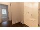 Laundry room with access from hallway and built-in shelving at 706 Dodd Ln # 157, Buford, GA 30518