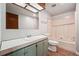 Clean bathroom with a tub, toilet, and vanity at 1265 Glenbrooke Cv, Lawrenceville, GA 30045