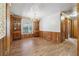 Bright dining room with wood built-ins and chandelier at 1265 Glenbrooke Cv, Lawrenceville, GA 30045