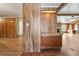 Wood paneled entryway with built-in shelving and flooring at 1265 Glenbrooke Cv, Lawrenceville, GA 30045