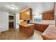 Spacious kitchen with wood cabinets and island at 1265 Glenbrooke Cv, Lawrenceville, GA 30045