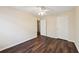 Bedroom with neutral walls and hardwood floors at 2320 Whitestone Pl, Alpharetta, GA 30005