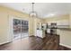 Eat-in kitchen featuring stainless steel appliances and sliding door to the backyard at 2320 Whitestone Pl, Alpharetta, GA 30005