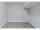 Neutral-toned basement with carpet flooring is a versatile space for a home office or living area at 250 Hermer Nw Cir, Atlanta, GA 30311