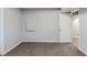 A finished basement features neutral paint, carpet flooring, and a walk-in closet at 250 Hermer Nw Cir, Atlanta, GA 30311