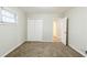 Bright bedroom with neutral walls, double closet and ample natural light at 250 Hermer Nw Cir, Atlanta, GA 30311