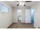 Bedroom with carpet, ceiling fan, and ensuite bathroom entrance at 250 Hermer Nw Cir, Atlanta, GA 30311