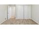 Comfortable bedroom with carpet, closet, and a view of the backyard at 250 Hermer Nw Cir, Atlanta, GA 30311