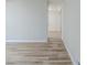 Inviting hallway featuring wood-look flooring that leads into other areas of the home at 250 Hermer Nw Cir, Atlanta, GA 30311