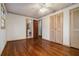 Bedroom with hardwood floors, built-in closet and en-suite bathroom at 3310 Chisholm Sw Trl, Marietta, GA 30060