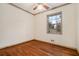 Hardwood floor bedroom with a window and ceiling fan at 3310 Chisholm Sw Trl, Marietta, GA 30060