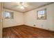 Hardwood floor bedroom with double door closet and window at 3310 Chisholm Sw Trl, Marietta, GA 30060