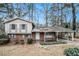 Brick ranch house with covered carport and small yard at 3310 Chisholm Sw Trl, Marietta, GA 30060