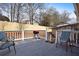 Relaxing back deck with chairs and grill at 3815 Landcraf Cv, Decatur, GA 30034