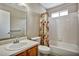 Clean bathroom with a tub, toilet, and vanity at 3815 Landcraf Cv, Decatur, GA 30034