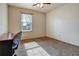 Bright bedroom with carpeted floor and a desk at 3815 Landcraf Cv, Decatur, GA 30034