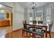 Dining area with view into kitchen and adjacent living space at 3815 Landgraf Cv, Decatur, GA 30034