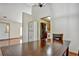 Spacious dining room with hardwood floors and view into kitchen at 3815 Landcraf Cv, Decatur, GA 30034