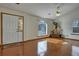 Hardwood floor entryway with front door and view to living room at 3815 Landcraf Cv, Decatur, GA 30034