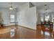 Bright living room with hardwood floors, dining area, and high ceiling at 3815 Landcraf Cv, Decatur, GA 30034