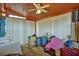 Sunroom with multiple windows and ceiling fan at 3815 Landcraf Cv, Decatur, GA 30034