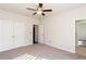 Spacious bedroom with double doors and carpet at 5015 Montes Ln, Cumming, GA 30040