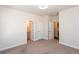 Bright bedroom with carpet flooring and en-suite bathroom at 5015 Montes Ln, Cumming, GA 30040