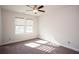 Bright bedroom with carpet and ceiling fan at 5015 Montes Ln, Cumming, GA 30040