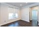 Bright dining room with hardwood floors and large windows at 5015 Montes Ln, Cumming, GA 30040