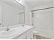 Clean bathroom with double vanity and shower/tub combo at 6738 Merrywood Dr, Fairburn, GA 30213