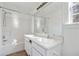 Clean bathroom with double vanity and shower/tub combo at 6738 Merrywood Dr, Fairburn, GA 30213