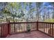 Wooden deck with wooded views at 6738 Merrywood Dr, Fairburn, GA 30213