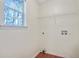 Laundry room with shelving and linoleum flooring at 6738 Merrywood Dr, Fairburn, GA 30213