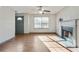 Living room with hardwood floors, fireplace and window at 6738 Merrywood Dr, Fairburn, GA 30213