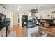 Modern kitchen with white cabinets, black countertops, and stainless steel appliances at 1809 Francon Sw Ct, Conyers, GA 30094