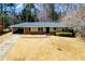 Ranch style home with driveway and yard at 2283 Country Club Sw Ln, Atlanta, GA 30311