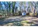 Backyard with shed and large, wooded area at 2283 Country Club Sw Ln, Atlanta, GA 30311