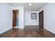 Bedroom with hardwood floors, ceiling fan and access to bathroom at 2283 Country Club Sw Ln, Atlanta, GA 30311