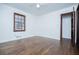 Bright bedroom with hardwood floors and ceiling fan at 2283 Country Club Sw Ln, Atlanta, GA 30311