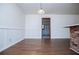 Bright dining room features hardwood floors and a brick breakfast bar at 2283 Country Club Sw Ln, Atlanta, GA 30311